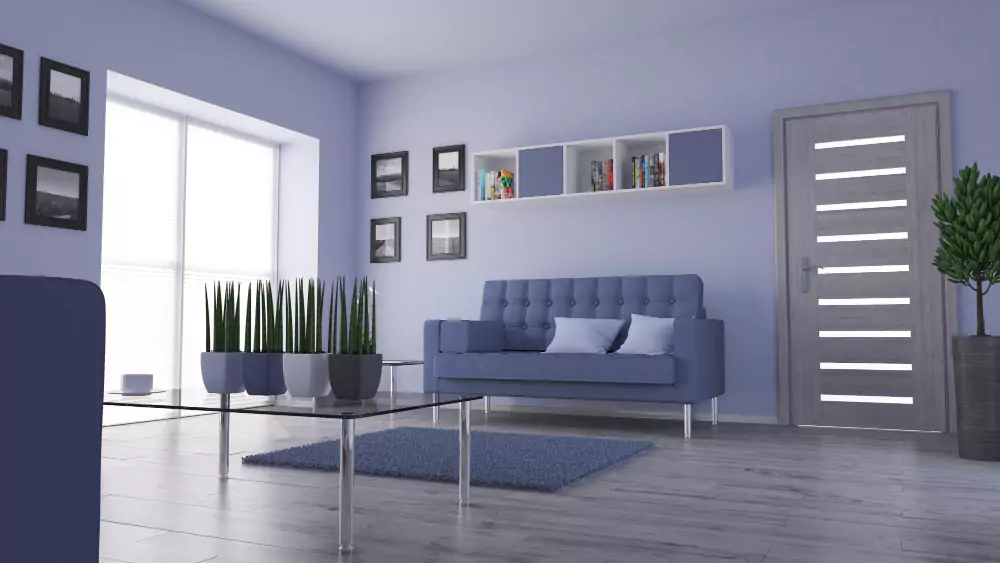 Living room with periwinkle blue sofa and freshly painted white walls