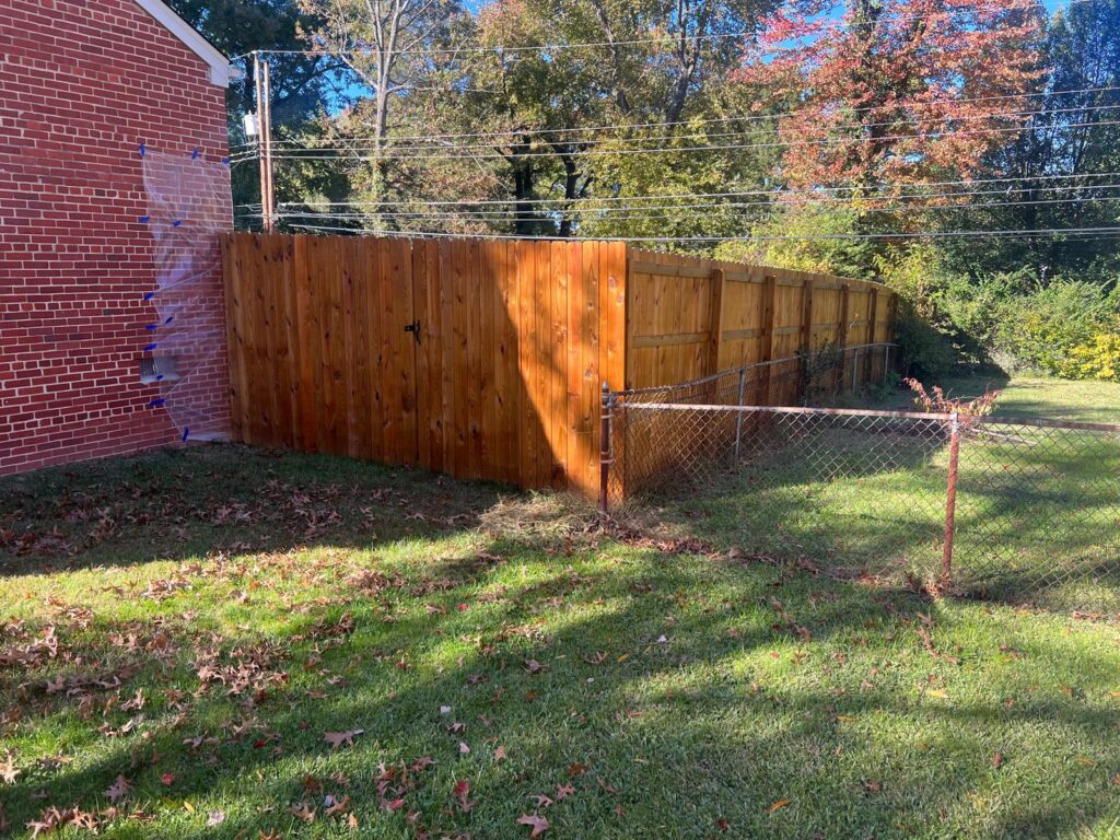 Stained wood privacy fence in a Richmond backyard