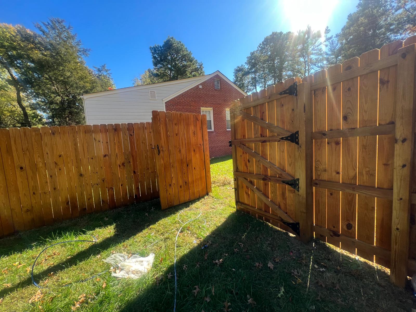 Cedar-stained fence and gate