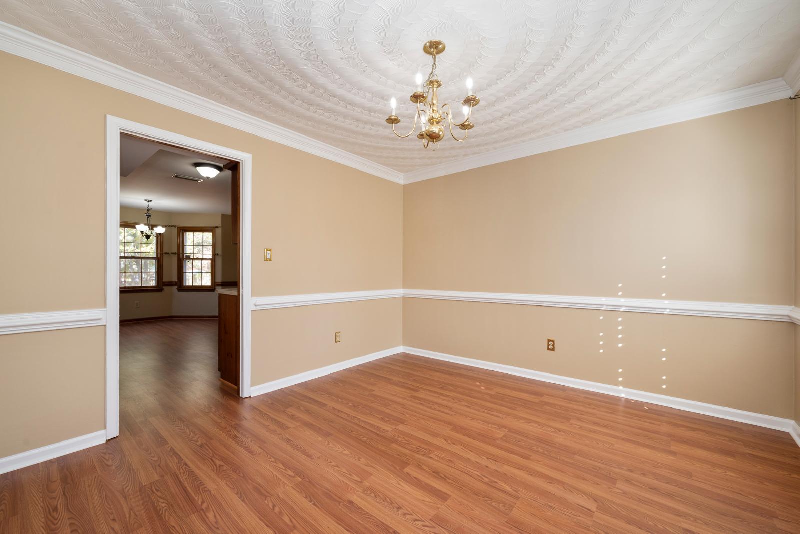 Classic room with painted crown molding and trim