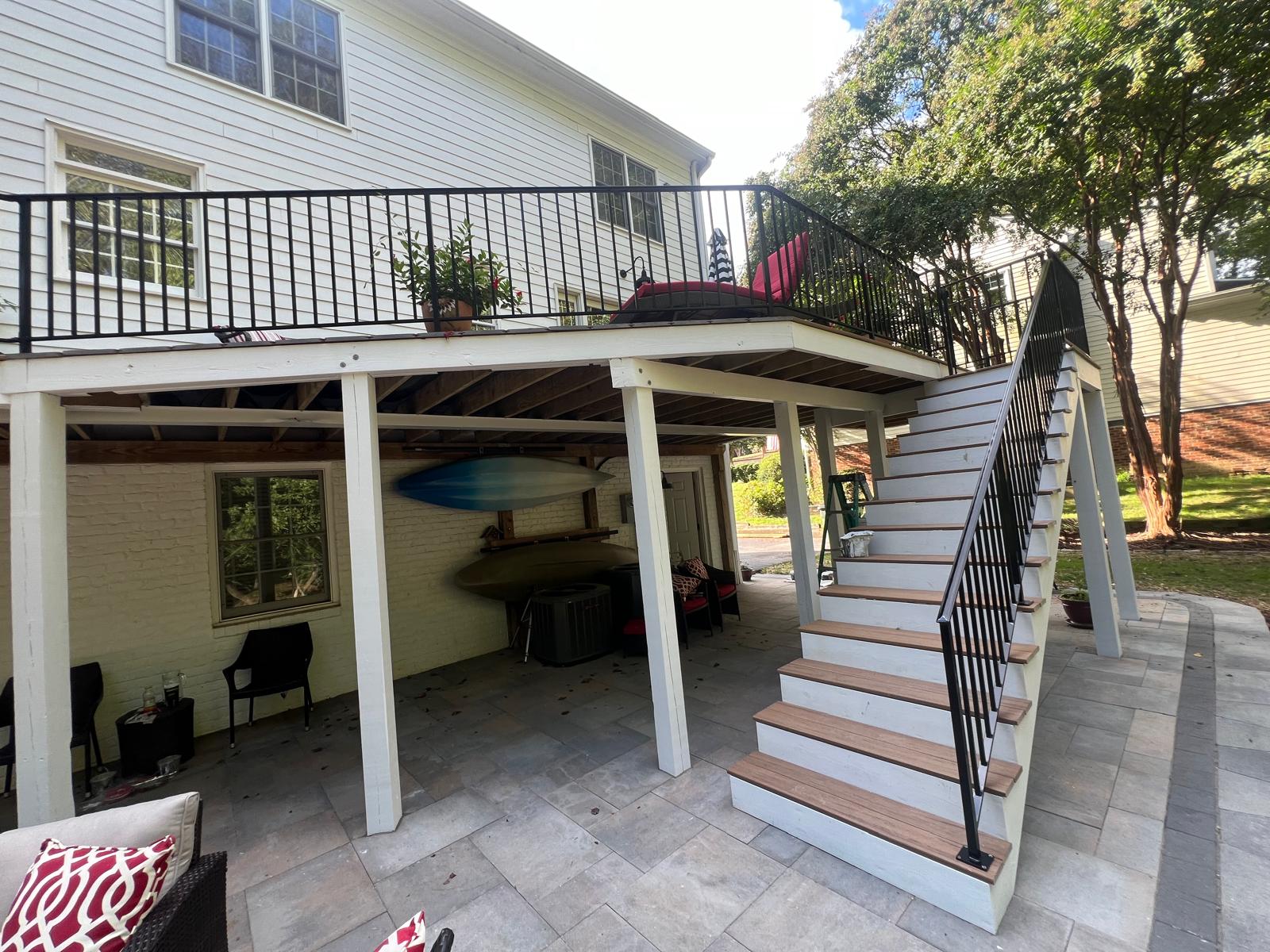 Deck stairs with white painted railings