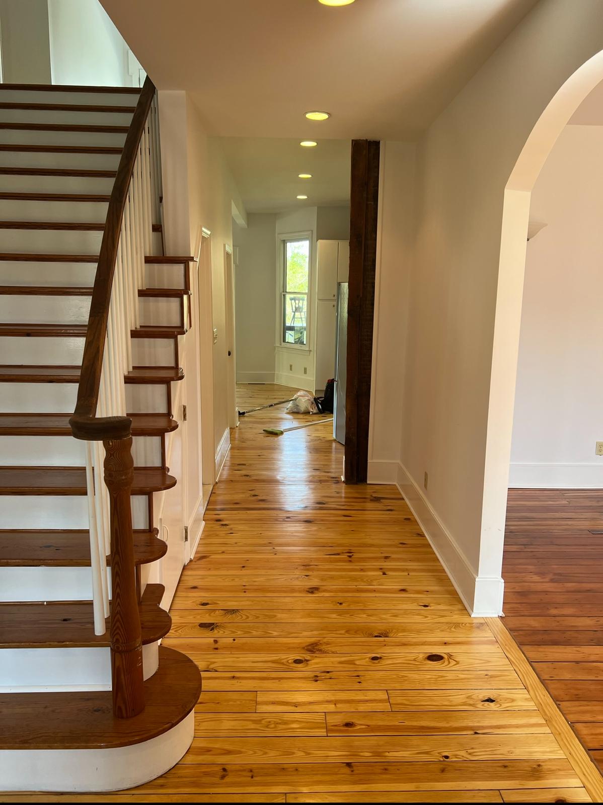 Staircase with stained treads and white painted risers