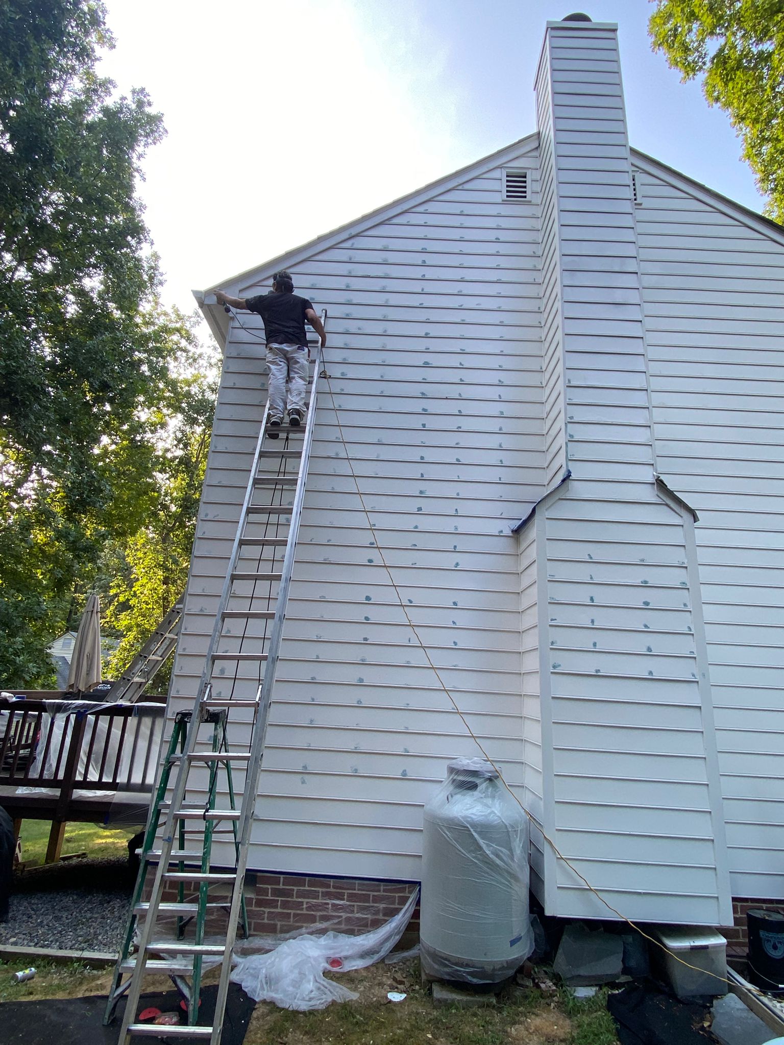 Exterior repaint in progress on a Richmond area home